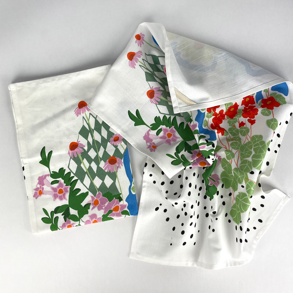 custom printed floral tea towel folded up