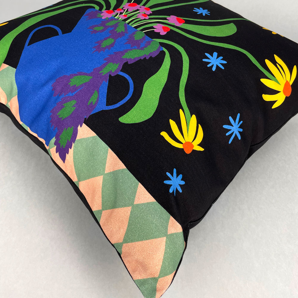 Custom printed 50cm square cushion with an illustration of cut flowers in a blue vase.